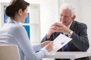 One-on-one meetings in a quiet room will help you maximise your hearing.