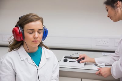 Student doing a hearing test at the university