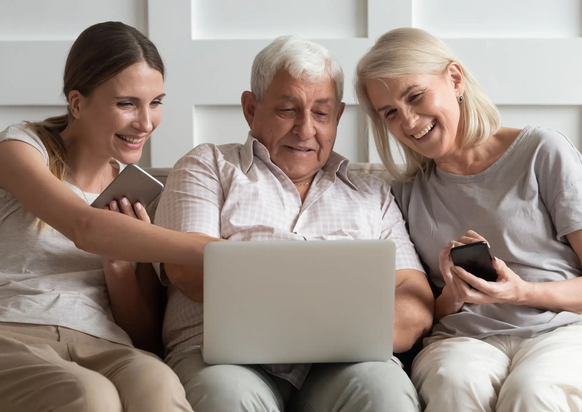 Elderly man with daughter and granddaughter